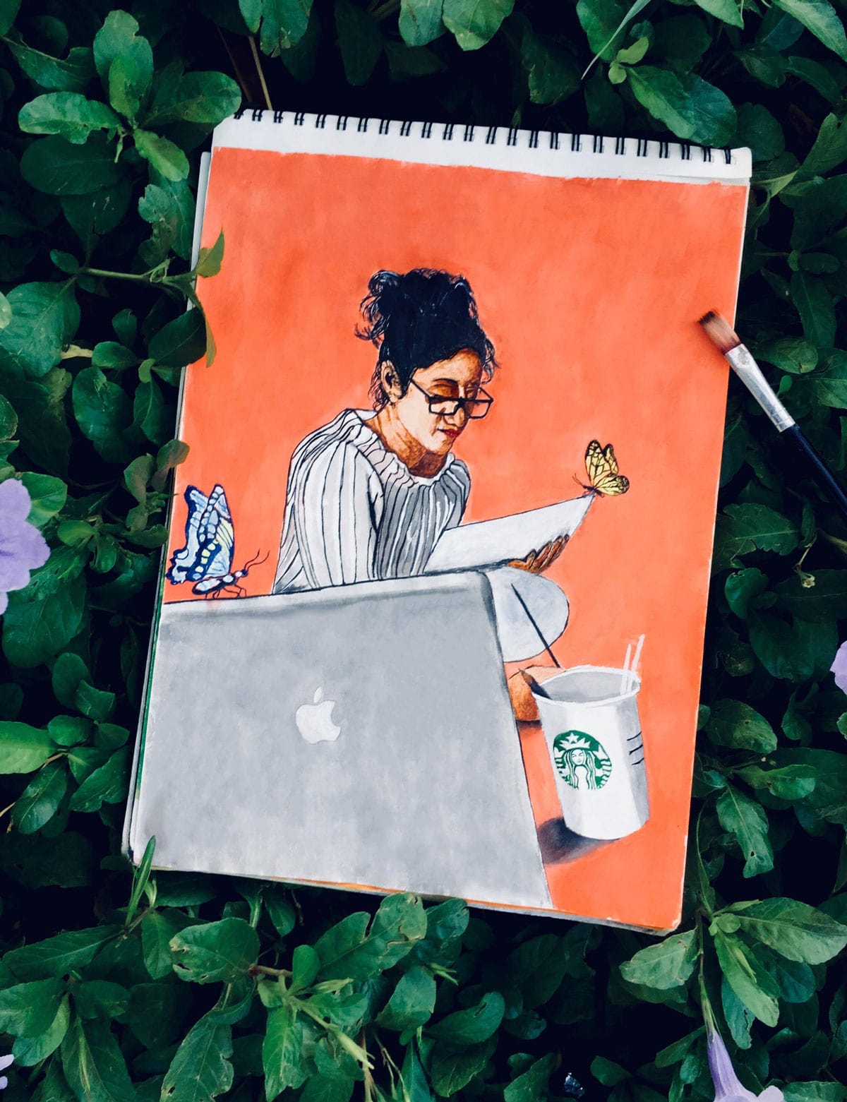 Painting of a girl writing on paper with starbucks cup infront along with a macbook